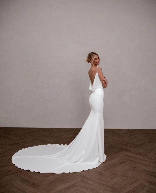 Alfie -- Subtle but impactful. Effortless but chic. ⁠
The perfect balance of contemporary simplicity with just enough drama that ensures all eyes are on you.⁠
⁠
Try her on in our Wellington boutique.